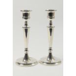 Pair of modern silver candlesticks, by Broadway Silversmiths, Birmingham 1993, plain tapered form