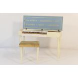 Morley clavichord, the cream and white finished case opening to a 51 key keyboard, raised on