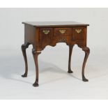 Queen Anne style walnut lowboy, quarter veneered top, feather and crossbanded and with kick-in