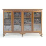 Chippendale Revival mahogany bookcase, circa 1900-10, having a blind fretwork frieze over four