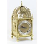 Winterhalder & Hoffmeier brass lantern style bracket clock, having a domed top with a bell over a