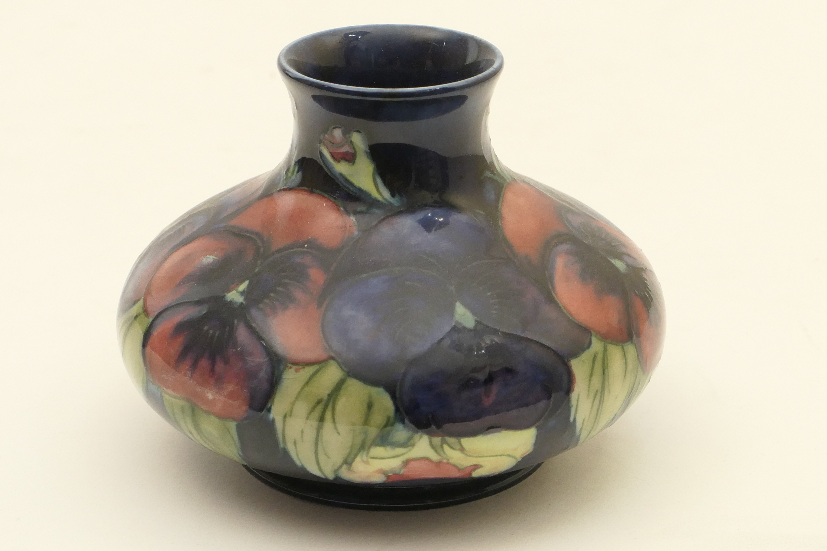 Moorcroft Pansies short baluster vase, circa 1920-30, impressed mark and painted signature,