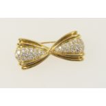 Quality 18ct gold and diamond brooch by D A Soley, London 1989, bow-tie shape pave set with 50 round