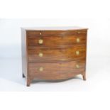 Late Regency mahogany bow front bachelor's chest, circa 1830, having a brushing slide over three