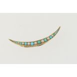 Late Victorian turquoise and pearl crescent brooch, circa 1890, the alternating graduated stones