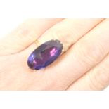Synthetic alexandrite dress ring, single oval cut stone of approx. 12cts (25mm x 12mm), in a six