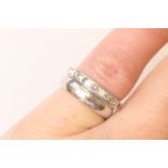 Diamond half eternity ring, set with ten small diamonds, channel set in platinum, size H, gross