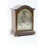 Winterhalder & Hoffmeier mahogany mantel clock, domed case with boxwood line inlays, silvered arched