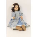 Schoenau & Hoffmeister bisque headed girl doll, brown crimped wig, sleeping blue glass eyes with