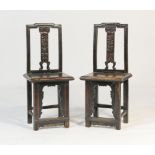 Two Chinese chairs, 18th or 19th Century, traditional form, each having a floral carved splat back