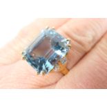 Aquamarine and diamond dress ring, step cut central aquamarine of approx. 12cts (14.2 x 12.3 x 9.