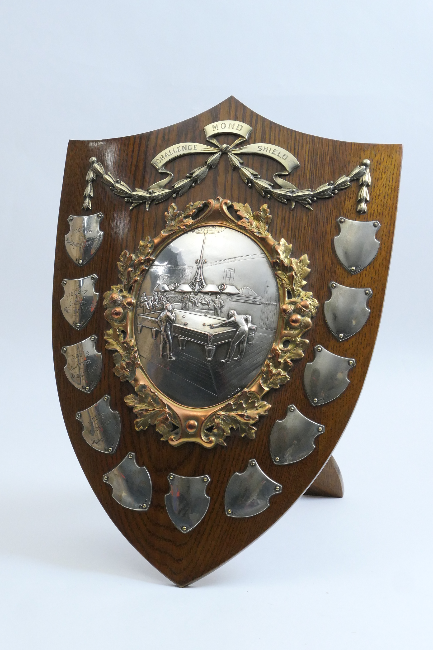 'Le Mond Challenge Shield for Billiards', the oak shield centred with a silver plated bas-relief