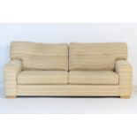 Collins & Hayes modern three seater settes, upholstered in oatmeal fabric, width 233cm, depth 100cm,