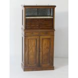 Late Victorian walnut dentistry cabinet, circa 1890, having a tambour front opening to a marble slab