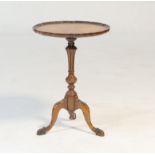Bevan Funnell Reprodux burr walnut pedestal wine table, dished top with quarter veneers over a