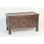 Oak joined coffer, circa 1680-1700, having three recessed panel top with original loop hinges,