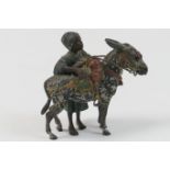 Austrian cold painted bronze, circa 1900, of a Nubian boy and his mule, marked 'Vienna', 7.5cm