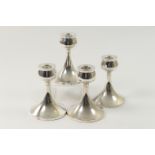 Set of four George VI silver dwarf candlesticks, maker WA, Birmingham 1949, in a modernist style,