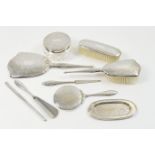 Birks (American) sterling silver vanity set, circa 1950-60, comprising shaped hand mirror, concave