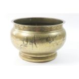 Japanese brass jardiniere, worked with a river landscape and fisherman, late Meiji, 31cm diameter