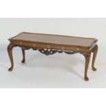 Burr walnut carved coffee table, shaped rectangular form raised on acanthus carved cabriole legs