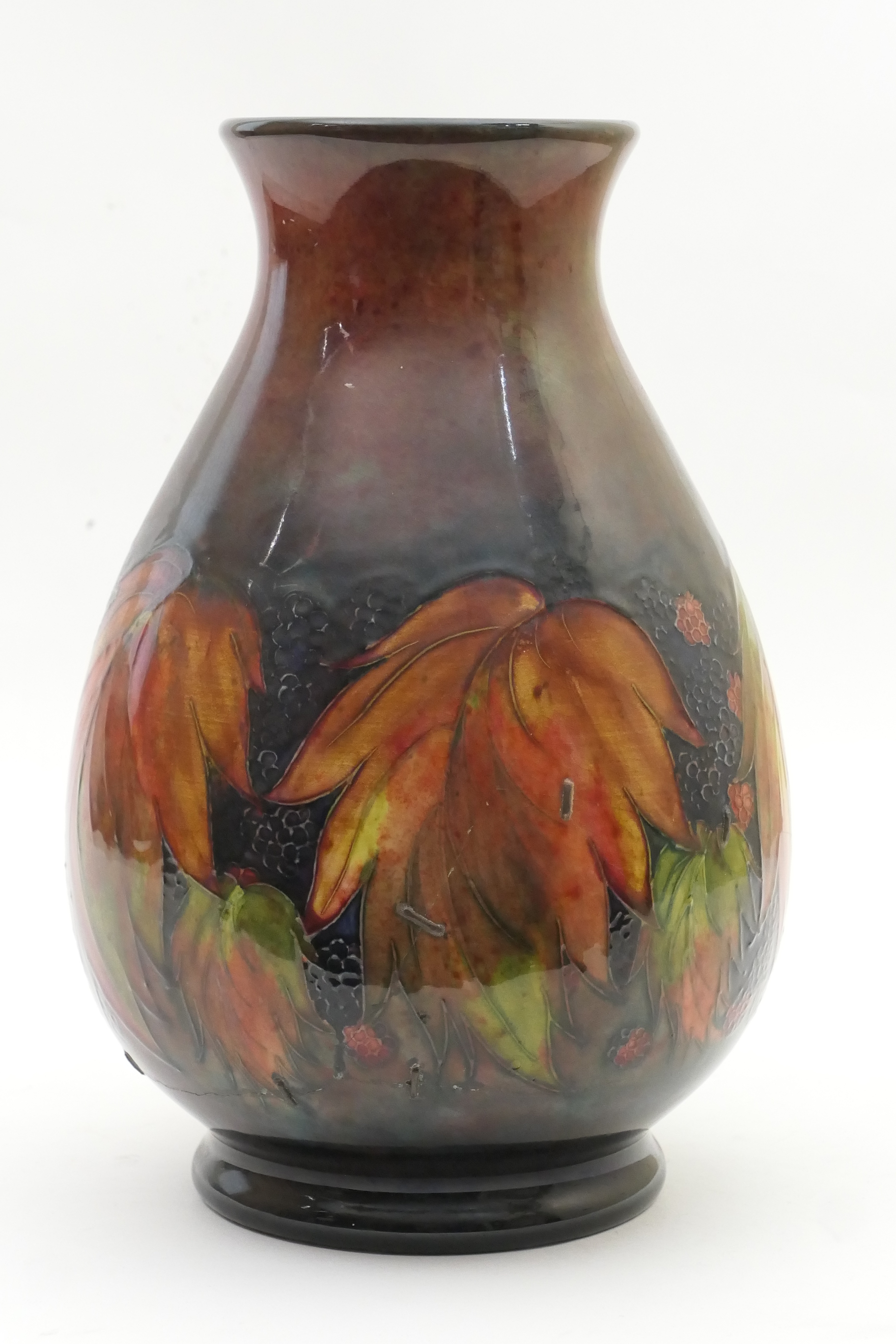 Moorcroft large Leaf and Berries vase, circa 1920s/30s, baluster form with flambé ground,