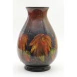 Moorcroft large Leaf and Berries vase, circa 1920s/30s, baluster form with flambé ground,