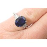 Attractive sapphire and diamond ring, the oval cut sapphire estimated as approx. 1.5cts, 8mm x