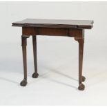 George III mahogany folding card table, circa 1770, the top folding over a single gate to the