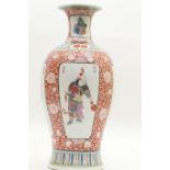 Chinese porcelain vase, ovoid form with trumpet neck and decorated with panels of figures in colours