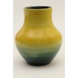 Moorcroft baluster vase, circa 1930s/40s, decorated with a shaded yellow through to blue ground,