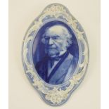 Burgess & Leigh Middleport Pottery Gladstone plaque, moulded and with a blue printed portrait of