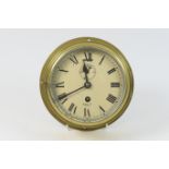 Smiths Astral brass bulkhead clock, 13.5cm dial with subsidiary, the back plate 20cm diameter Please