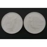 Pair of Eneret relief moulded porcelain plaques, emblematic of Night and Day, impressed marks, 14.