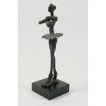 Decorative modernist cast metal sculpture of a ballet dancer, on pointe, 23cm, mounted on a black