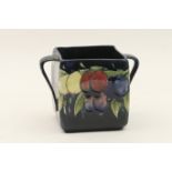 Moorcroft Wisteria biscuit box, circa 1918-29 twin handled square section (lacking cover), with a