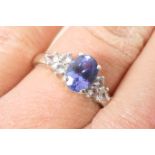 Decorative 9ct white gold dress ring, set with blue and white gemstones (untested), size Q, weight