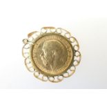 George V sovereign, 1911, Ottowa Mint, in a loose 9ct gold pendant mount, gross weight approx. 10.5g