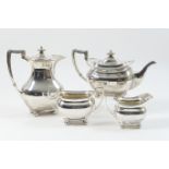 George V four piece silver tea service, maker HA, Sheffield 1920/21, plain bombe shape with reeded