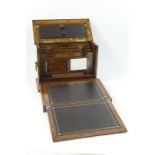 Late Victorian oak stationery and writing box, the case with a hinged cover opening to reveal a