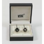 Pair of Mont Blanc silver cufflinks, turning and with black cat eye inlay, cased, with service guide