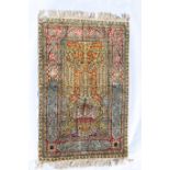 Fine Persian silk and gilt threadwork tree of life rug, the busy gilt ground field worked with