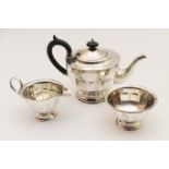 Silver three piece tea service, by Edward Viners, Sheffield 1930, comprising U-shaped teapot with