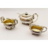 George III composite silver three piece tea service, comprising sucrier and milk jug by R & S