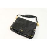 Givenchy handbag, square shape, the black leather with flap closure and maker's logo and with