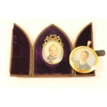 George V portrait miniature of a young boy, quarter length, oval, mounted within a silver gilt