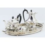 George V silver four piece tea service, Birmingham 1921, comprising teapot, hot water jug, milk