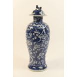 Chinese blue and white prunus pattern covered vase, late 19th Century, slender ovoid form with domed