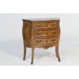 Italian walnut and marquetry bombe chest, the top inlaid with floral sprays in boxwood and harewood,