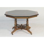 Victorian ebonised mahogany octagonal centre table, circa 1880, the top supported on wrythen moulded
